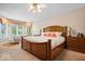Spacious main bedroom with sitting area and a large window view at 817 Hickory Way, Noblesville, IN 46062