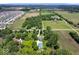 Property with expansive land, mature trees, pond, home, outbuilding, and proximity to a residential area at 881 W 1050 N, Fortville, IN 46040