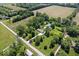 Property's layout with a long driveway leading to the house, surrounded by mature trees at 881 W 1050 N, Fortville, IN 46040