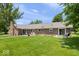 Spacious backyard of brick home perfect for outdoor activities and relaxation at 881 W 1050 N, Fortville, IN 46040