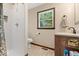 Bathroom with tiled walk-in shower, granite countertop, and an open window at 881 W 1050 N, Fortville, IN 46040
