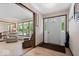 Inviting foyer with hardwood floors and an entry to the adjacent living room at 881 W 1050 N, Fortville, IN 46040