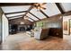 Warm living room with a brick fireplace, wood accents, and comfortable seating at 881 W 1050 N, Fortville, IN 46040