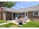 Cozy backyard patio with outdoor seating, a fire pit, and stylish decor at 881 W 1050 N, Fortville, IN 46040