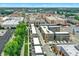 Aerial view of a mixed-use urban development with various residential and commercial buildings at 906 Berkhamsted Ln, Carmel, IN 46032