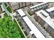Overhead view of complex featuring rooftop terraces and walkways with lush green landscaping at 906 Berkhamsted Ln, Carmel, IN 46032
