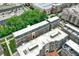 Aerial view of modern townhomes and mixed-use buildings, showcasing the urban landscape at 906 Berkhamsted Ln, Carmel, IN 46032
