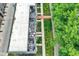 Aerial view of a building with a private terrace showcasing landscaping and outdoor seating at 906 Berkhamsted Ln, Carmel, IN 46032