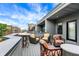 Enjoy the urban view from this balcony, featuring outdoor seating and a serene atmosphere at 906 Berkhamsted Ln, Carmel, IN 46032