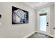 Bright foyer featuring a statement piece of art and natural light at 906 Berkhamsted Ln, Carmel, IN 46032