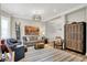 Bright and airy living room with elegant furnishings and a relaxed atmosphere at 906 Berkhamsted Ln, Carmel, IN 46032