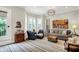 Comfortable living room with stylish accents, a chic coffee table, and plenty of space at 906 Berkhamsted Ln, Carmel, IN 46032