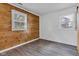 Bedroom features modern flooring, wood accent wall, and natural light at 917 W Busby St, Lebanon, IN 46052