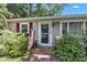 Close up shot of the front door with a visible house number and an American flag at 917 W Busby St, Lebanon, IN 46052