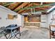 A workbench and pegboard add utility to the unfinished garage, providing ample space for tools and projects at 917 W Busby St, Lebanon, IN 46052