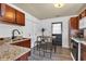 Functional kitchen boasting granite countertops, stainless steel appliances, and an island with seating at 917 W Busby St, Lebanon, IN 46052