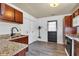 Traditional kitchen features wood cabinetry, granite counters, and stainless steel appliances at 917 W Busby St, Lebanon, IN 46052