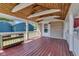 Spacious front porch with wood flooring, a wooden ceiling, and plenty of shade at 917 W Busby St, Lebanon, IN 46052