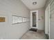Clean, well-lit entryway with secure mailboxes and an access control system at 932 N Broadway St # 4, Indianapolis, IN 46202
