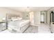 Serene bedroom with a luxurious bed, a chandelier, and a stylish rug at 10306 Tybalt Dr, Fishers, IN 46038
