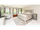 Bright bedroom with large windows, stylish decor, and marble flooring at 10306 Tybalt Dr, Fishers, IN 46038