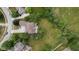 A high-definition aerial view shows the home, the spacious property, and the surrounding neighborhood at 10455 Trewithen Ln, Carmel, IN 46032