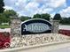 Welcome to Ashbrooke: a lovely neighborhood, as seen at the entrance sign with stone accents at 10455 Trewithen Ln, Carmel, IN 46032