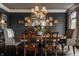 Formal dining room with hardwood floors, crown molding, stylish chandelier, and elegant decor at 1089 Laurelwood, Carmel, IN 46032