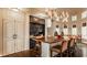 Gourmet kitchen featuring a large island, custom cabinetry, and modern lighting fixture at 1089 Laurelwood, Carmel, IN 46032