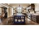 Gourmet kitchen boasts a center island, custom cabinets, and professional-grade appliances at 1089 Laurelwood, Carmel, IN 46032