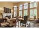 Bright and airy living room with a fireplace, hardwood floors, and plenty of natural light at 1089 Laurelwood, Carmel, IN 46032