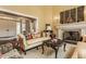 Tastefully decorated living room featuring a fireplace, classic furnishings, and neutral decor at 1089 Laurelwood, Carmel, IN 46032