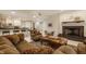 Inviting living room features comfortable seating, fireplace, and a stylish bar area at 1089 Laurelwood, Carmel, IN 46032