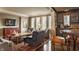 Elegant living room features hardwood floors, wet bar, and an abundance of natural light at 1089 Laurelwood, Carmel, IN 46032