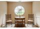Sitting area features a decorative round window and a small table with two chairs at 1089 Laurelwood, Carmel, IN 46032