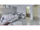 Cozy bedroom featuring soothing gray walls and a comfortable bed, creating a relaxing retreat at 11117 Waterfield Pl, Indianapolis, IN 46235