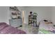 Shared bedroom featuring bright walls, comfortable beds, and natural light for cozy relaxation at 11117 Waterfield Pl, Indianapolis, IN 46235