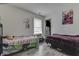 Shared bedroom featuring neutral walls, comfortable beds, and natural light for cozy relaxation at 11117 Waterfield Pl, Indianapolis, IN 46235