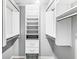 Walk-in closet with custom shelving and storage, offering ample space and organization at 11222 Boston Way, Fishers, IN 46038