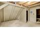 Inviting attic room with dormer ceilings and painted walls offers ample space for creative use at 1155 Cope Rd, Martinsville, IN 46151