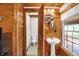 Bright bathroom featuring pedestal sink, and natural light at 1155 Cope Rd, Martinsville, IN 46151