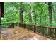 Picture of the spacious wood deck overlooking a lush green space at 1155 Cope Rd, Martinsville, IN 46151
