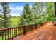 Wide wooden deck offers beautiful green space views at 1155 Cope Rd, Martinsville, IN 46151
