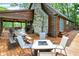 Expansive deck with outdoor seating and a scenic view of the grounds at 1155 Cope Rd, Martinsville, IN 46151