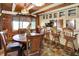 Cozy dining area next to the kitchen and living room features a decorative moose statue at 1155 Cope Rd, Martinsville, IN 46151
