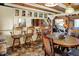 Open-concept dining area with counter seating, tile flooring, and modern fixtures, perfect for entertaining at 1155 Cope Rd, Martinsville, IN 46151