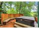 Hot tub on a private wooden deck surrounded by green space at 1155 Cope Rd, Martinsville, IN 46151
