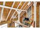 High angle of living room features wood beams, vaulted ceiling, stone fireplace and decor at 1155 Cope Rd, Martinsville, IN 46151