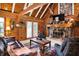Relaxing living room with a stone fireplace, wood accents, and comfortable seating arrangement at 1155 Cope Rd, Martinsville, IN 46151