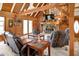 Inviting living room features a stone fireplace, wood accents, and comfortable leather seating at 1155 Cope Rd, Martinsville, IN 46151